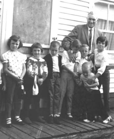 446: J V McCarthy and seven of his grandchildren, l-r Mary, Anna, Jamie, Cede, Joe, Terry,  and (in front) Peter McCarthy. (circa 1966) [courtesy of Teresa (Healey)  McCarthy]  - J V son of Thomas McCarthy &amp;amp; Anastasia Fitzgerald, married Julia Reddy; all  children of Vincent McCarthy &amp;amp; Teresa Healey